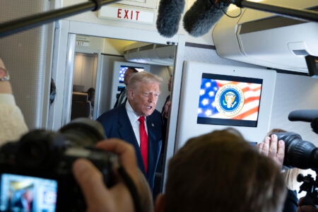 President Donald Trump boards Air Force One